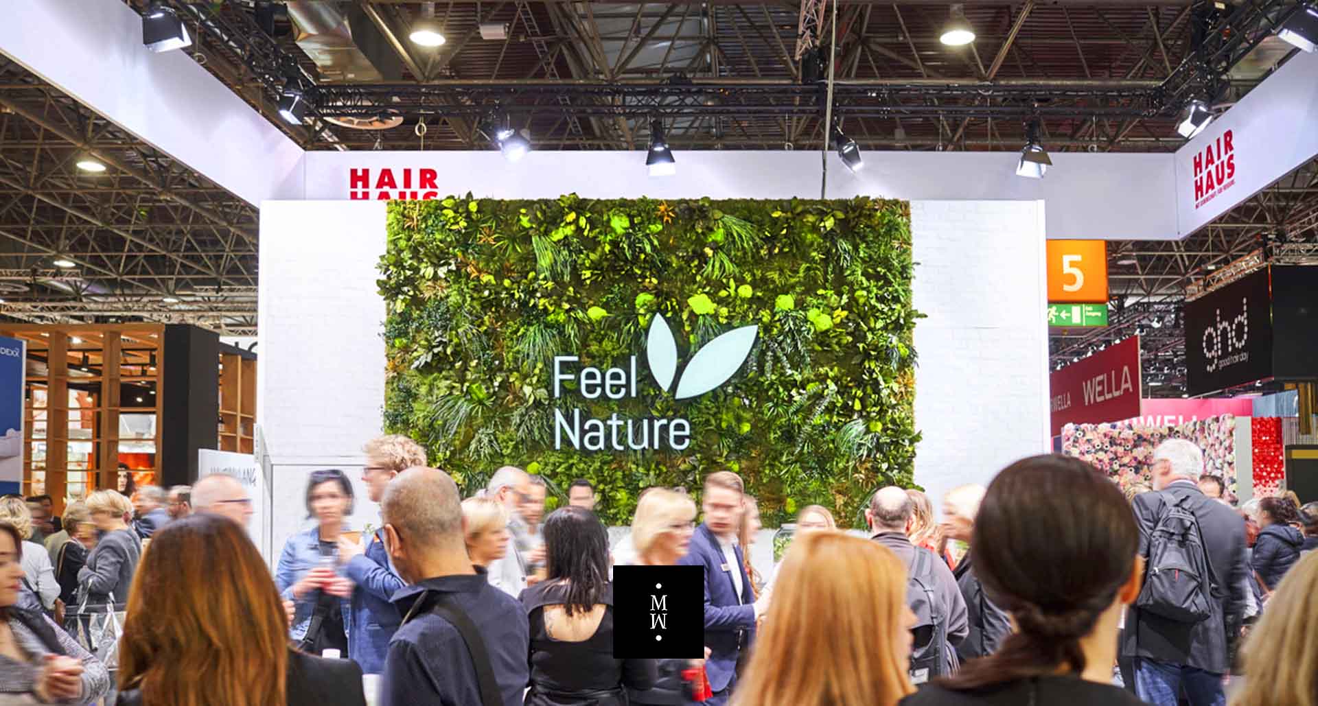 Dschungelmooswand Messestand Logo Feel Nature